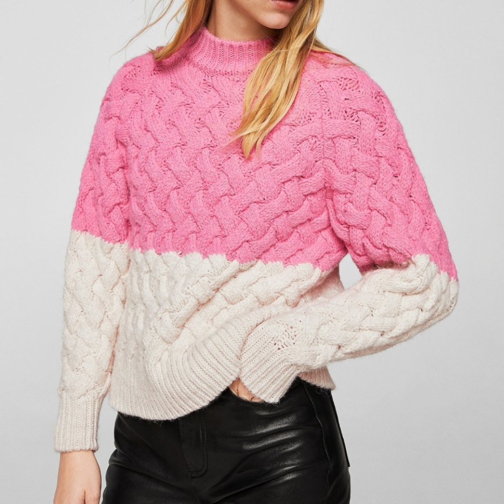 Bicolor cable-knit sweater